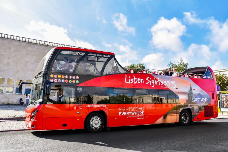 Lisbon: Hop-On Hop-Off Bus Tour - Castle Line: old neighborhoods, steep streets, and Fado