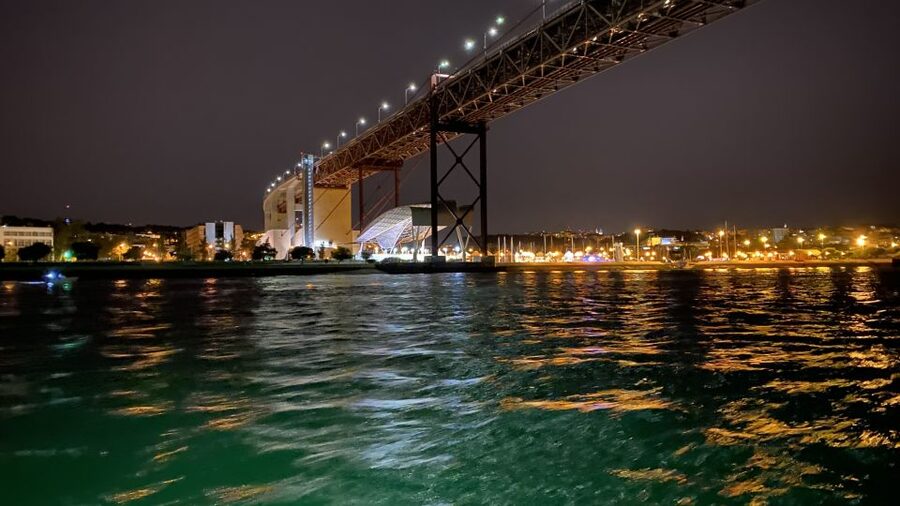 Lisbon: Luxury Sailboat Cruise at Night - Under the 25 de Abril Bridge