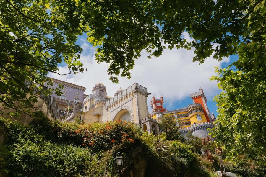 Lisbon: MiniBus Sintra, Pena, Regaleira, Cap Roca Tour - Pena Palace: color, symbols, and steep paths