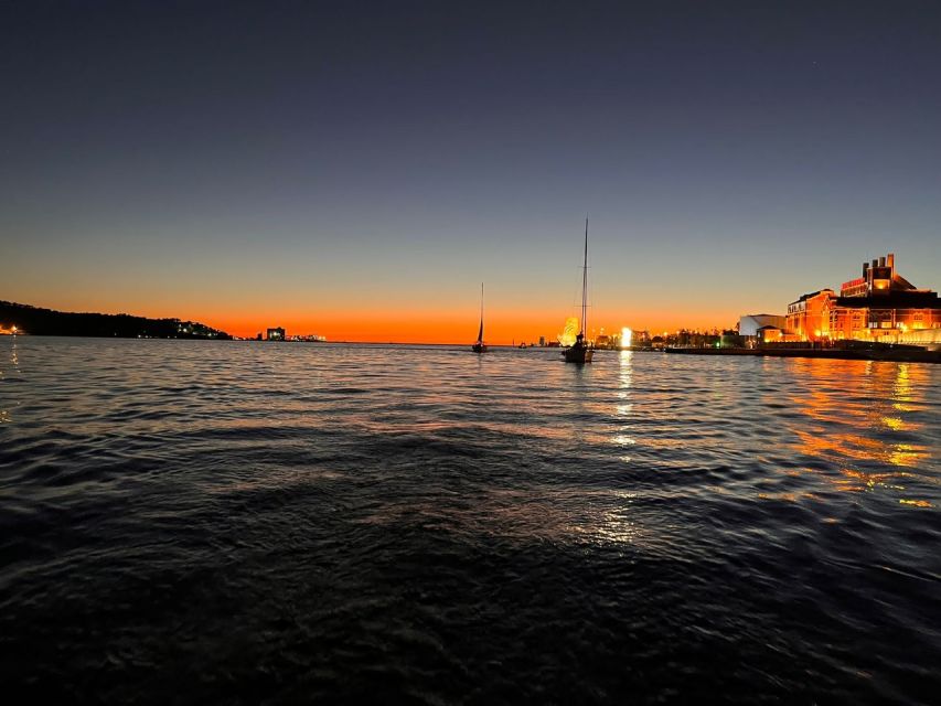 Lisbon: Sailboat Sunset Tour with a Drink - Christ the King from the river