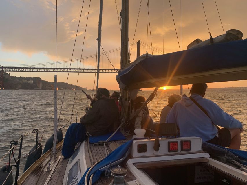 Lisbon: Sailboat Sunset Tour with a Drink - Sailing past Commerce Square and Almada