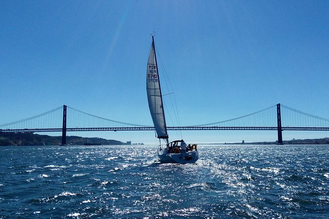 Lisbon Sailing Tour on a Luxury Sailing Yacht with 2 Drinks - Drinks, cheese, and the social side of the trip