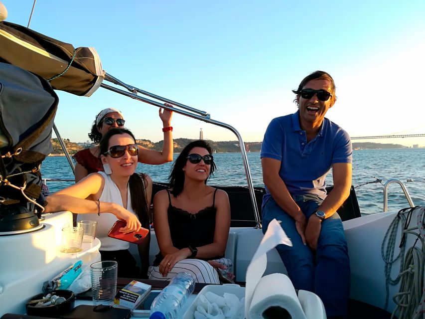 Lisbon: Sailing Tour with Wine and Snacks - Under the 25 de Abril Bridge