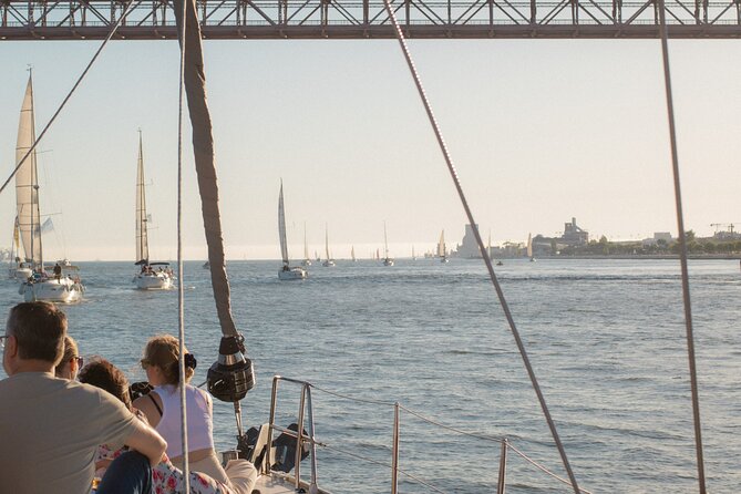Lisbon Sunset Boat Cruise Tour With Drinks Included - Alfama, the Cathedral, and the castle from the river