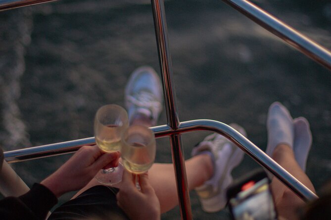 Lisbon Sunset Boat Cruise Tour With Drinks Included - Drinks, snacks, music, and the practical comforts