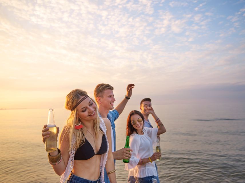 Lisbon: Sunset Boat Party Cruise with DJ and Open Bar - Boat size, weather, and comfort