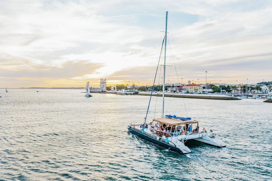 Lisbon: Sunset Catamaran Boat Tour with Music and Drinks - How much value do you get for $26?