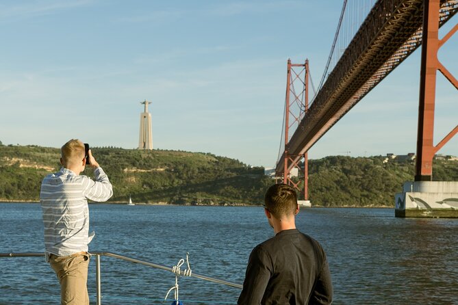Lisbon: Sunset Catamaran Boat Tour with Music and Drinks - A sunset cruise built around the view
