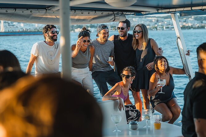 Lisbon: Sunset Catamaran Boat Tour with Music and Drinks - The Monument to the Discoveries and Jerónimos Monastery