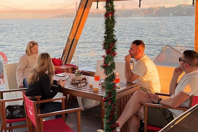Lisbon: Sunset Catamaran Boat Tour with Music and Drinks - MAAT and the old power station
