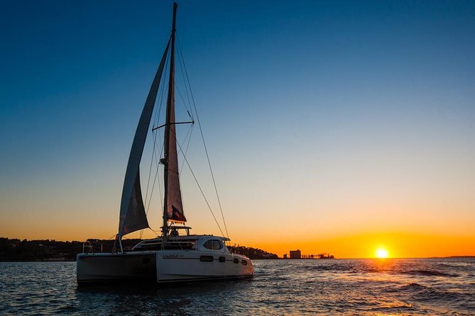 Lisbon: Sunset Cruise With Drinks on Spacious Yacht - A spacious catamaran with room to spread out