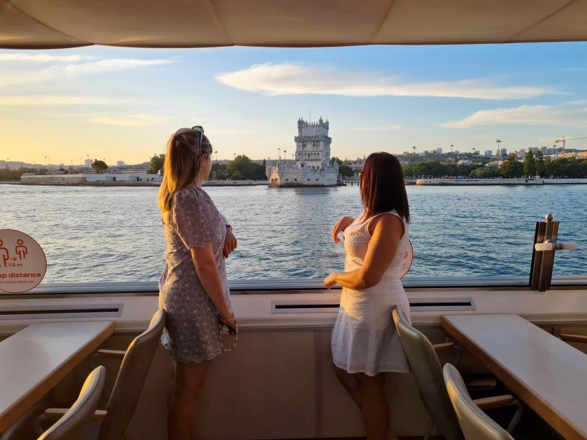 Lisbon: Sunset Cruise with Welcome Drink and Snacks - Seating, music, and the onboard mood