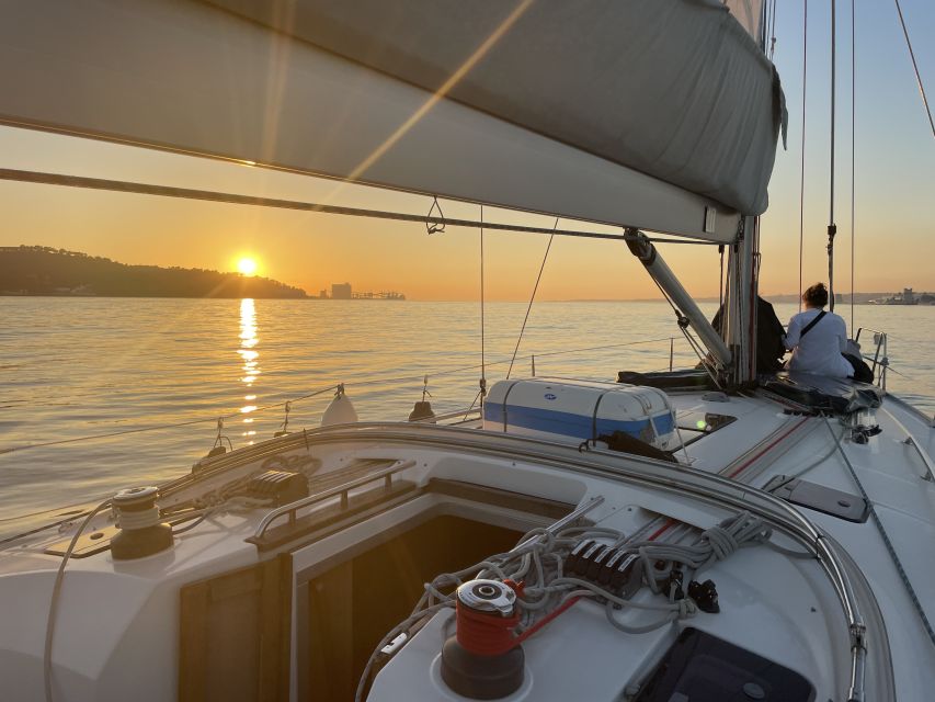 Lisbon: Sunset Sailing Boat Cruise with Wine - Belem Tower and the western waterfront