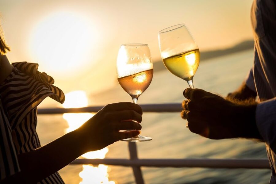 Lisbon: Sunset Sailing Boat Cruise with Wine - Baixa, Alfama, and Bairro Alto from the river