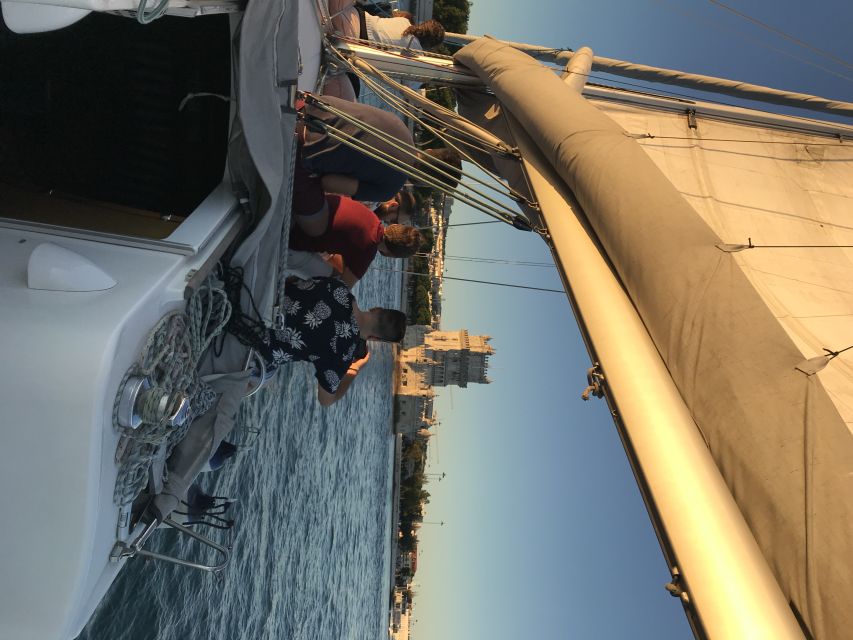 Lisbon Sunset Sailing – Small Group (max 10) Wine & History - Setting out beneath the 25th of April Bridge