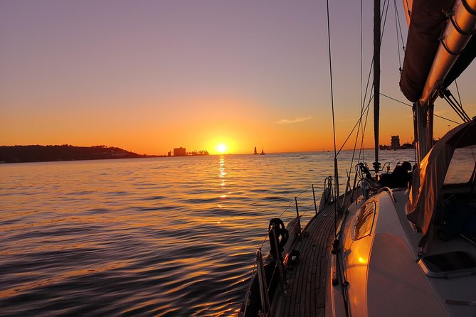 Lisbon Sunset Sailing Tour on Luxury Sailing Yacht with 2 Drinks - The bridge, Cristo Rei, and the open river