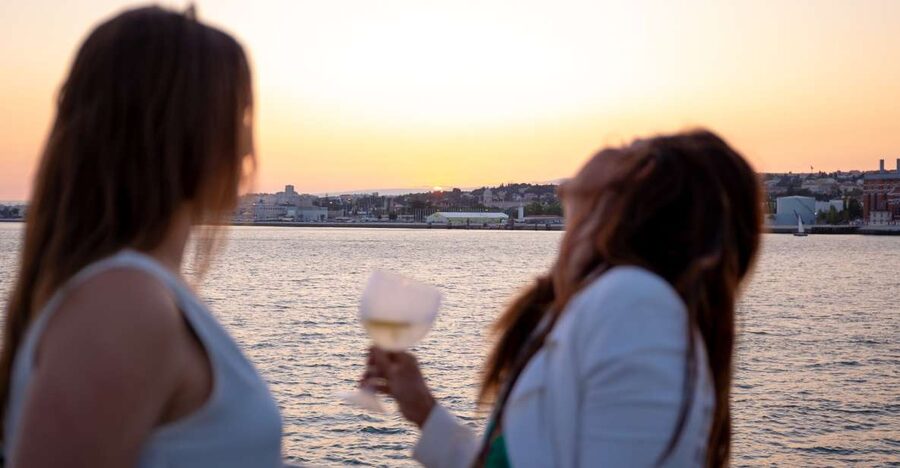 Lisbon: Tagus River Sunset Tour with Snacks and Drink - Commerce Square from the river