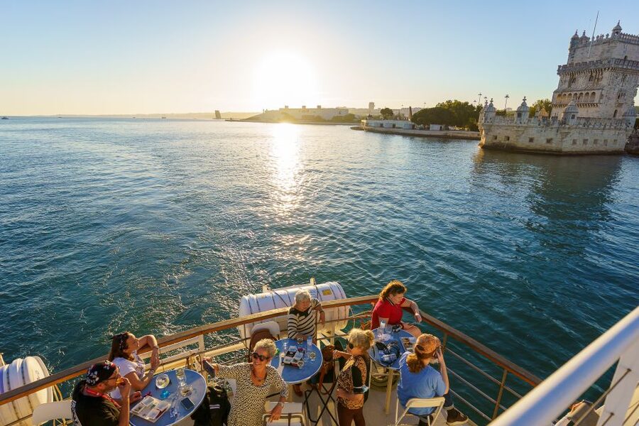 Lisbon: Tagus River Sunset Tour with Snacks and Drink - Choosing between the sundeck and the indoor seating