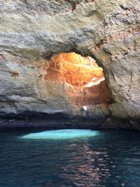 Portimão: Caves, Benagil and Algarve Coastline Boat Tour - Following the cliffs toward Marinha Beach