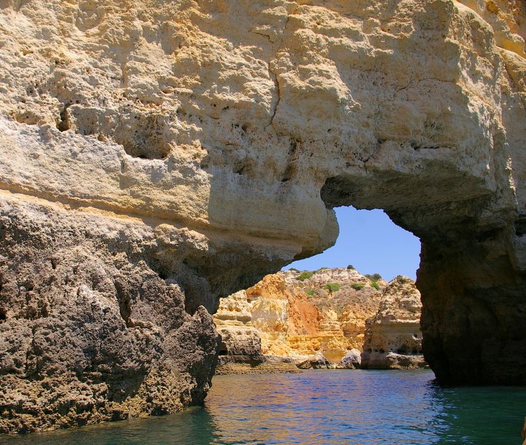 Portimão: Pirate Ship Cave Cruise - The return journey, dolphins, and sunset light