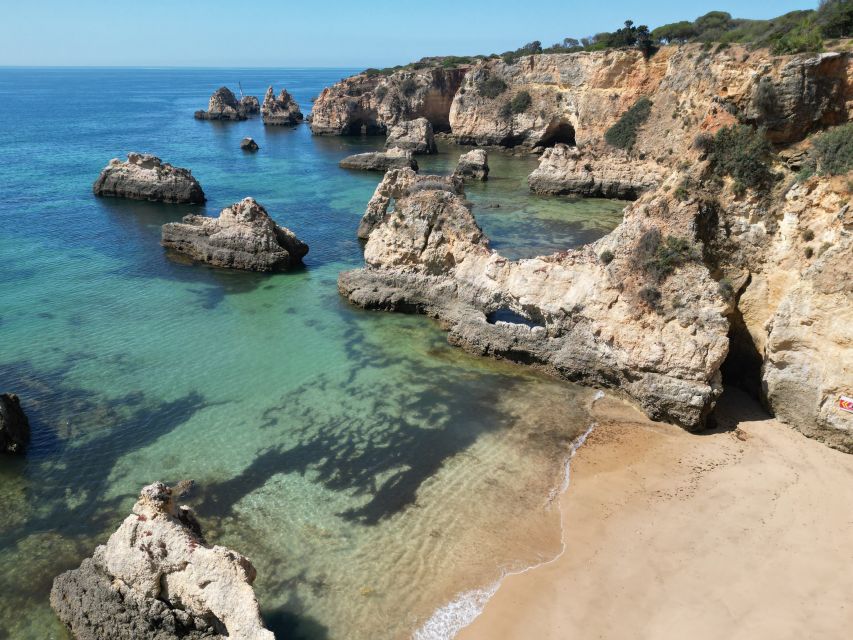Portimão: Small Group Kayak Cave and Cliff Tour - What the guide adds