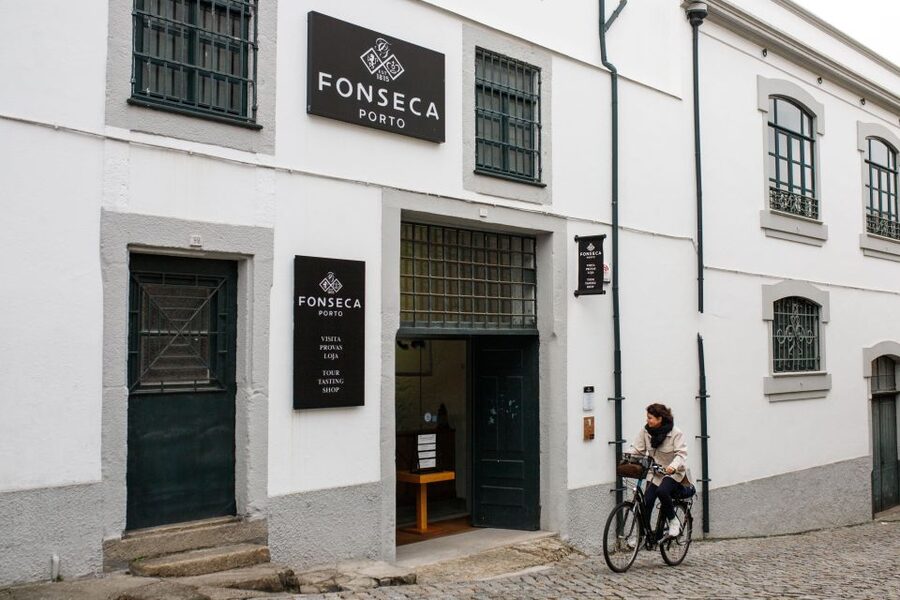 Porto: Fonseca Cellar Tour & Fado Show with Optional Dinner - Entering Fonseca’s cellars and hearing the Port story