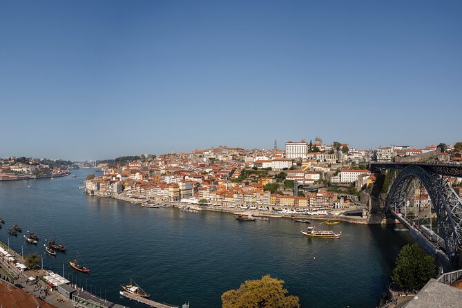 Porto Walking Tour, Lello Bookshop, River Cruise and Cable Car - The Douro cruise beneath Porto’s bridges