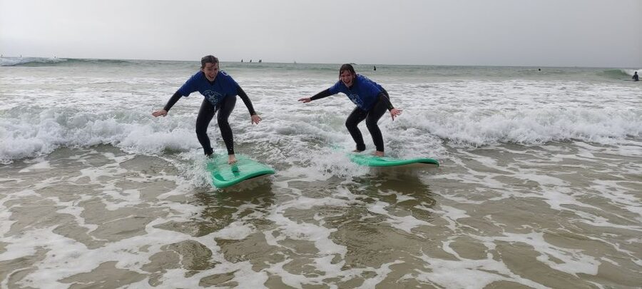 Quarteira: 2-Hour Surf Lesson at Falésia Beach - The first 20 minutes: safety, warm-up, and getting ready