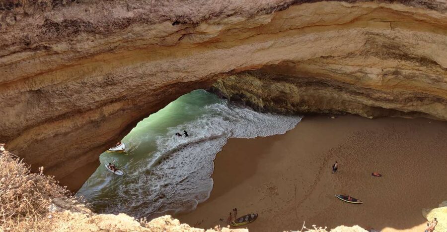 Quarteira: Benagil Cave Guided Catamaran Day Cruise & Drink - Entering Benagil Cave when conditions allow