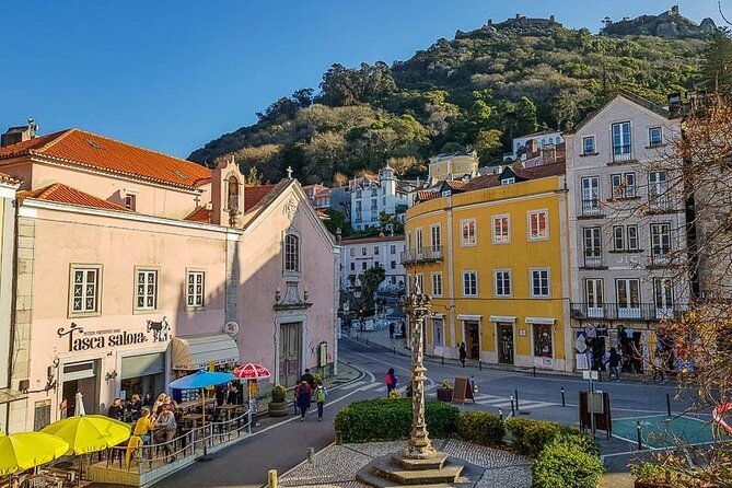 Sintra, Pena Palace, Quinta da Regaleira & Cascais Group Tour - Sintra village, pastries, and a short first look