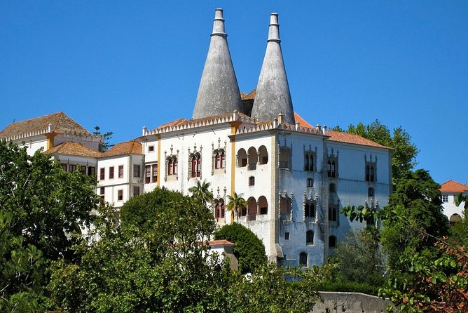 Sintra, Pena Palace, Quinta da Regaleira & Cascais Group Tour - Estoril and the ride back to Lisbon