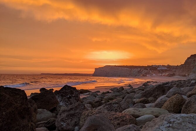 Sunset Yoga at Lagos's beautiful beach by el Sol Lifestyle - The sunset, cliffs, and ocean view
